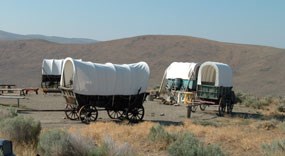 Photo image of emigrant wagons at Flagstaff Hill & the National Historic Oregon Trail Interpretive Center. Photo image of emigrant wagons at Flagstaff Hill & the National Historic Oregon Trail Interpretive Center.