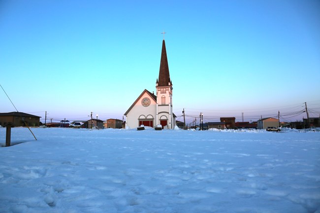 Anvil City Square in winter with St Joe's church in background.