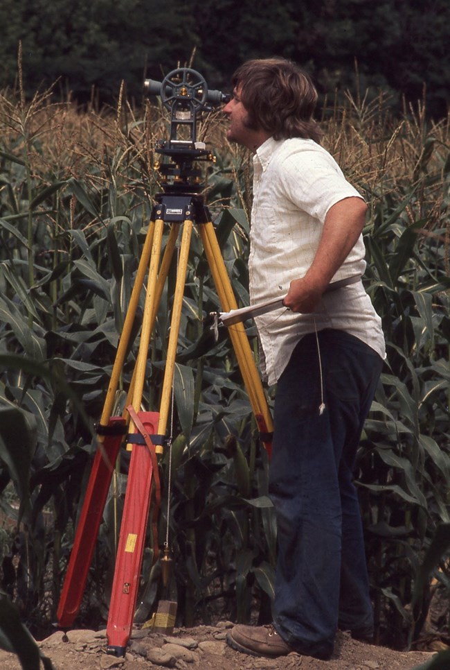 Man using GPS equipment