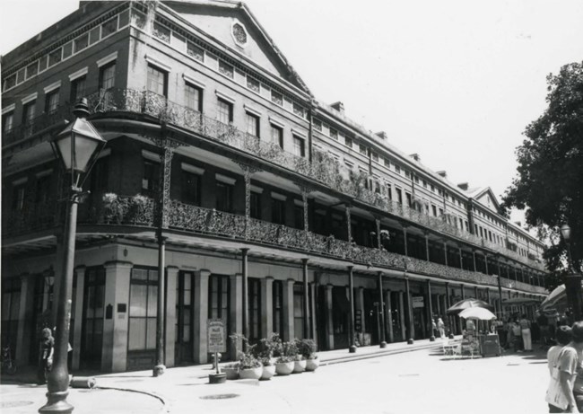 Two story building on a corner street of New Orleans.