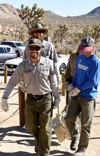 Volunteers and staff work together to maintain trails at Joshua Tree National Park. NPS Photo/ Hannah Schwalbe