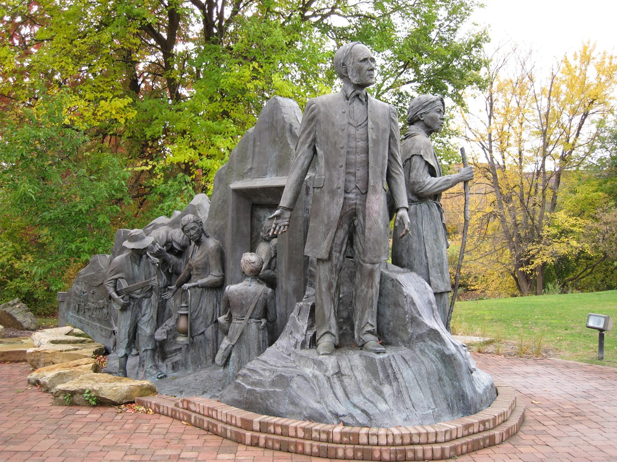 A bronze sculpture of Harriet Tubman and other Underground Railroad operators.
