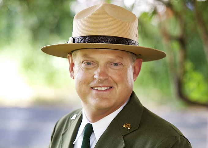 Photo of Bob Vogel in NPS uniform with flat hat