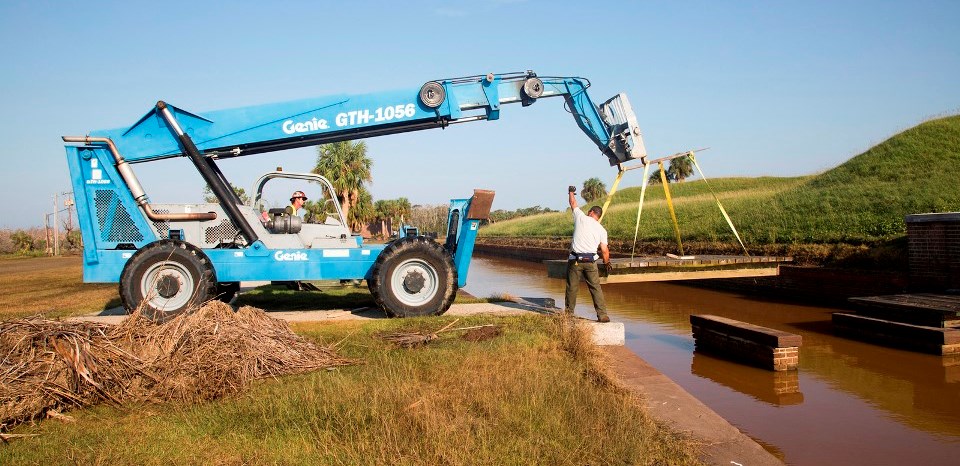 Bridge Repair at Fort Pulaski National Monument after Hurricane Irma NPS staff use heavy equipment to replace a footbridge into the fort