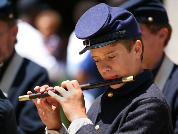 Flute player in a late 19th century U.S. Army uniform