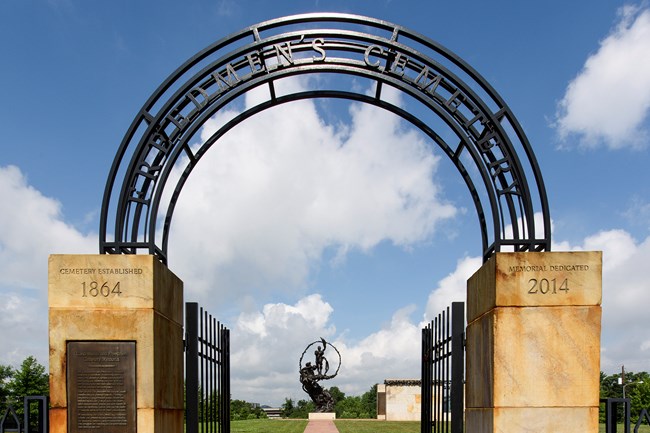Entrance to the Contrabands and Freedman Cemetery and Memorial View of the Freedmen Memorial from the Cemetery entrance