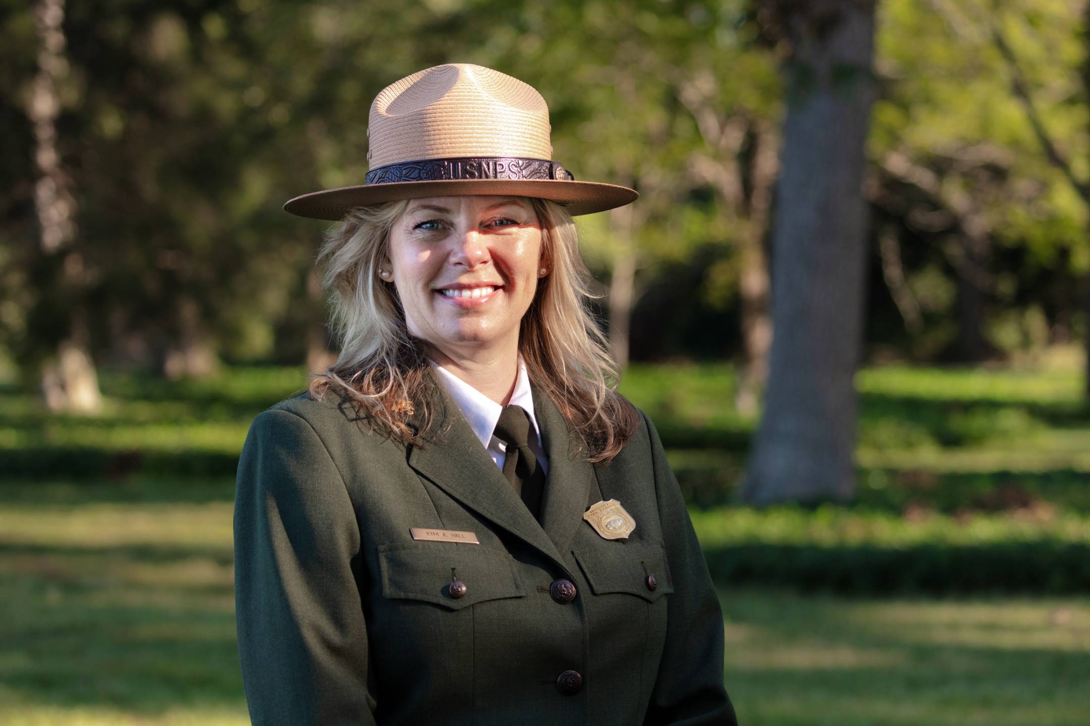 Portrait of a female park ranger outdoors