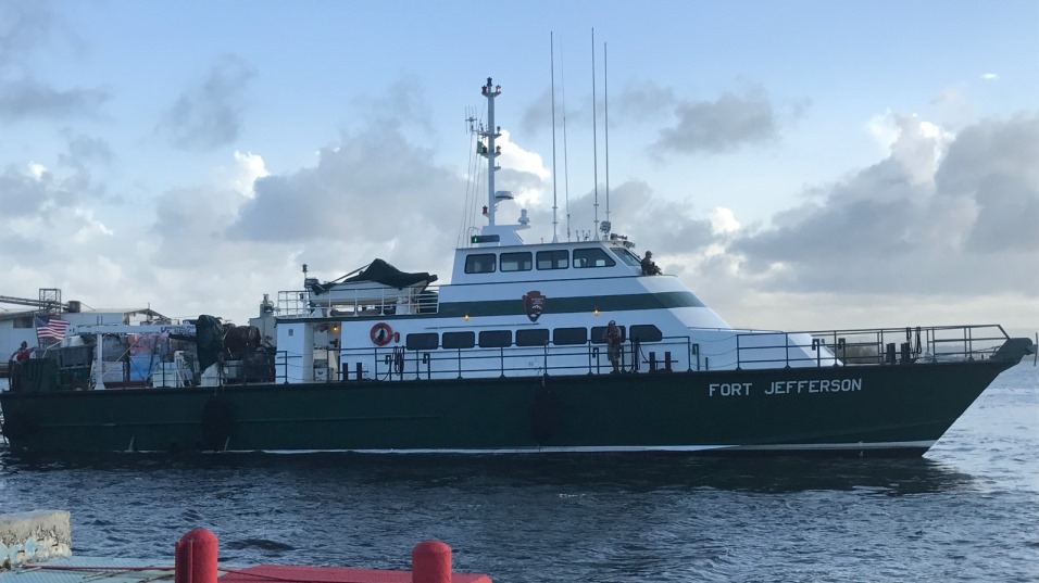 NPS Motor Vessel Fort Jefferson arrives in San Juan with emergency stabilization supplies and equipment for national parks in the Caribbean 110-foot vessel docking with blue sky behind it