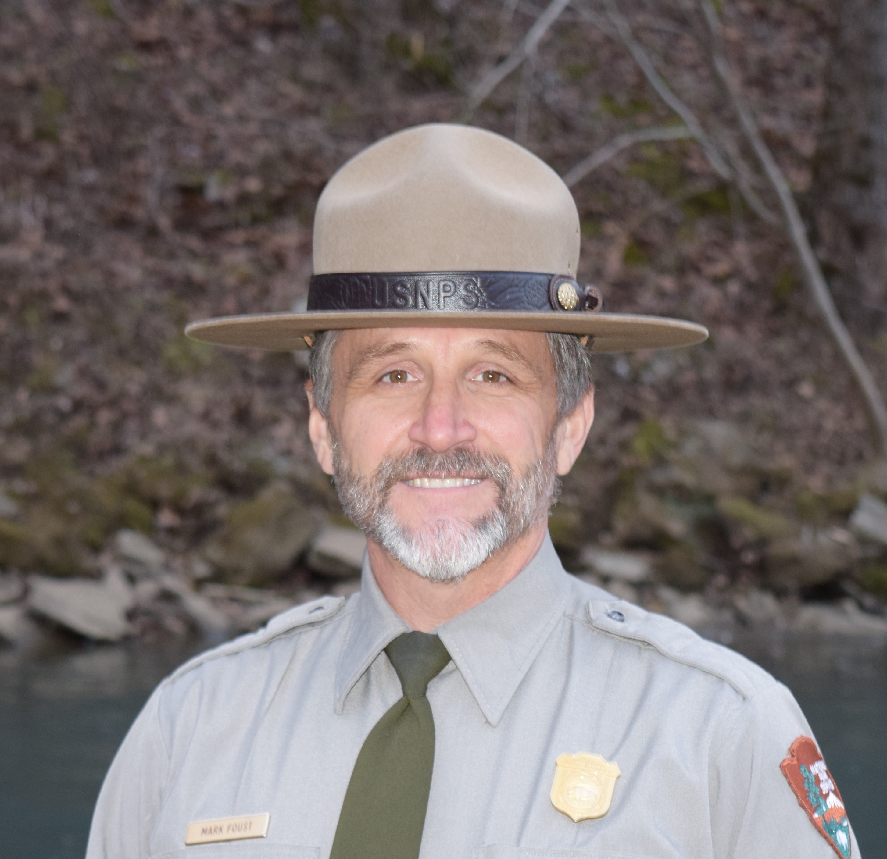 Headshot of a park ranger in uniform