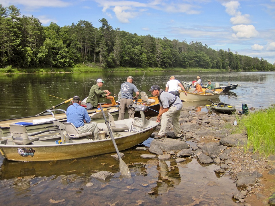 Group of military veterans launching fishing boats