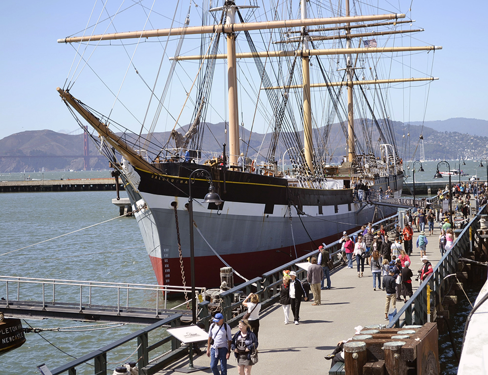 SAFR Balclutha Crowd visiting a historic frigate docked at a pier