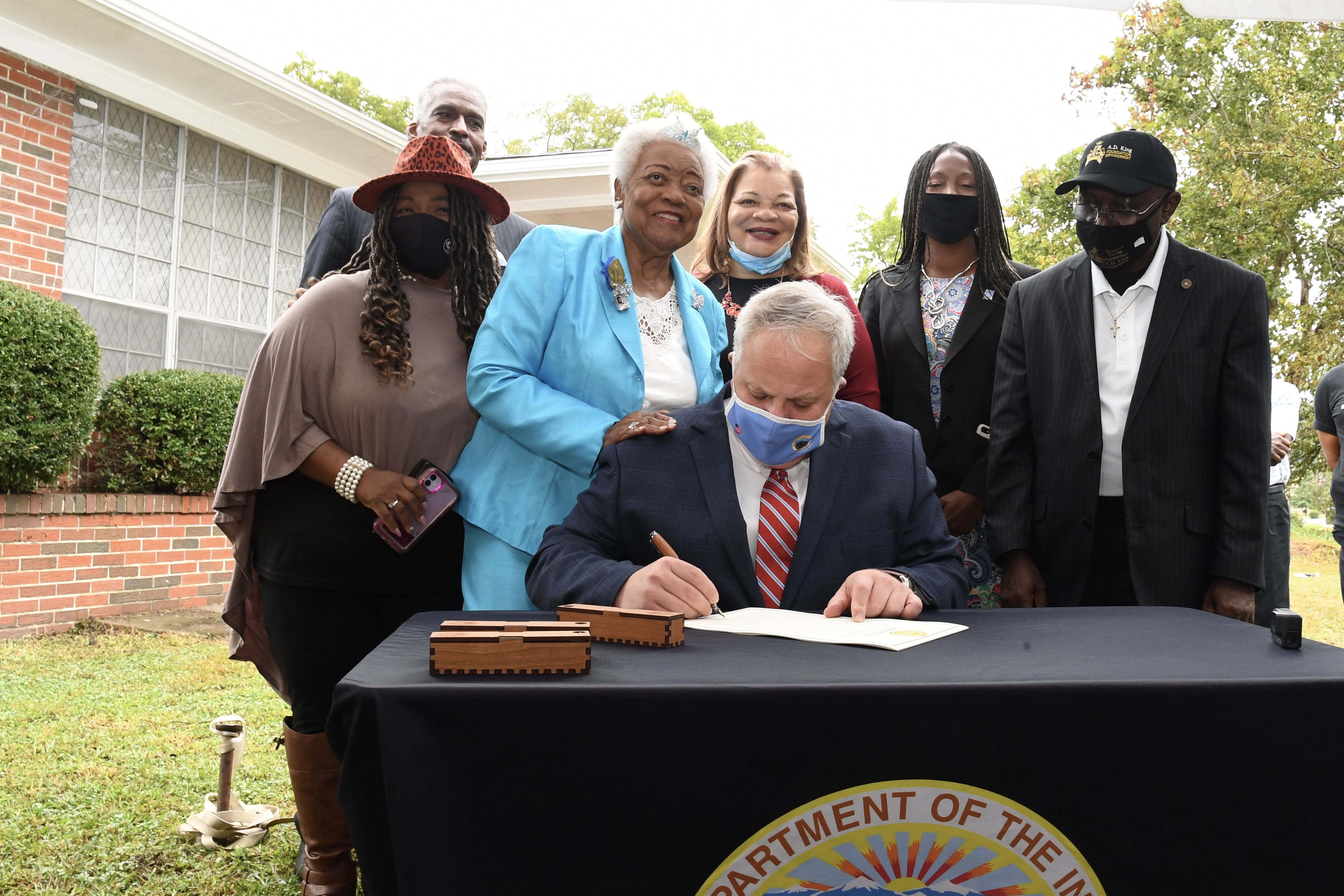 Secretary Bernhardt designated the A.D. King, Sr. house to be included in the African American Civil Rights Network Secretary Bernhardt with Naomi Ruth Barber King, Dr. Alveda King, Omie Crockett, Jacqueline Washington Crockett and other distinguished guests at the Reverend A.D. King, Sr. house.