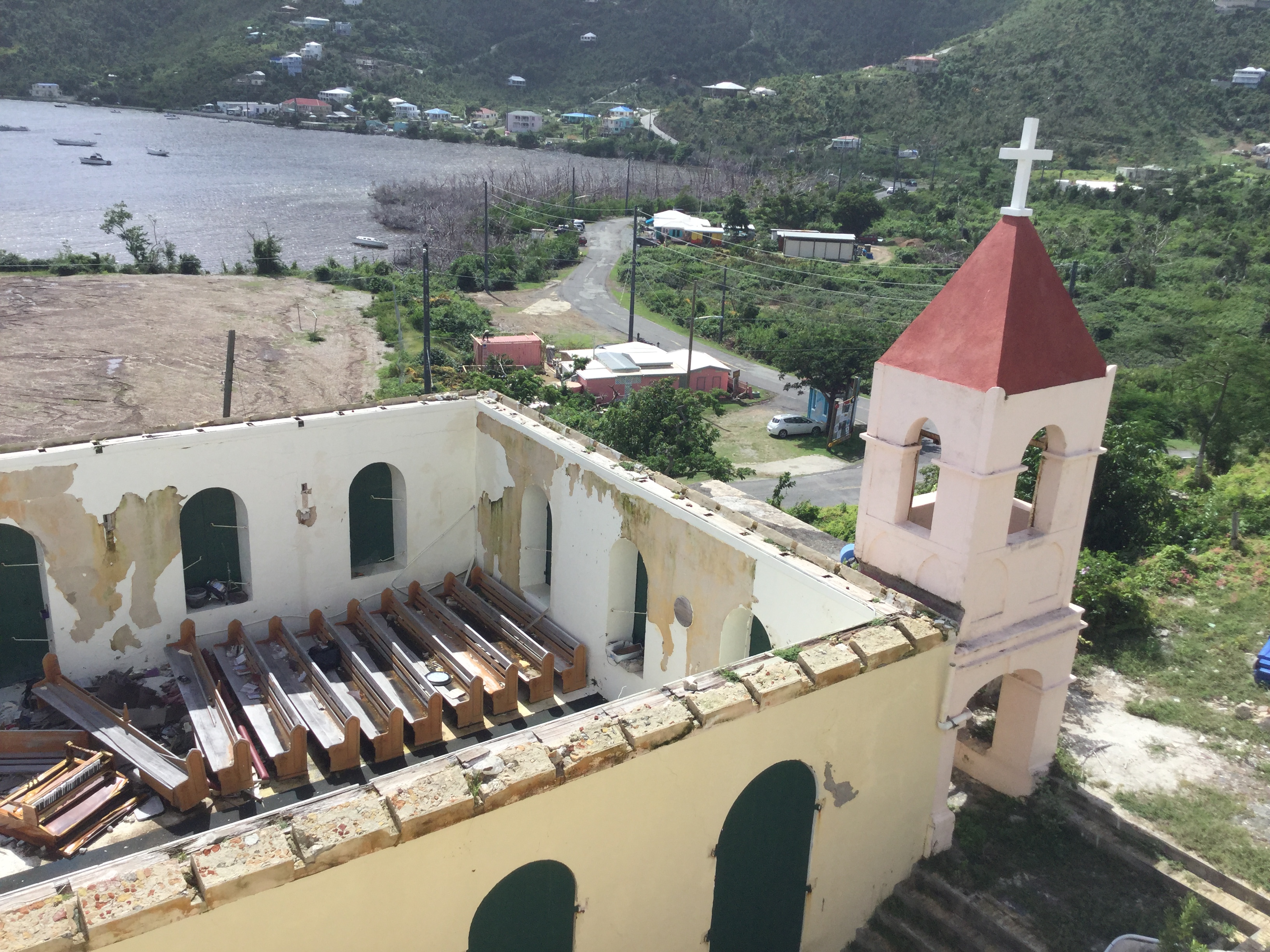 Aerial view inside a church damaged by a hurricane.