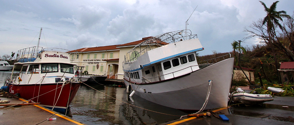 Hurricane Irma effects at Virgin Islands National Park Ferry boat resting on dock after storm damage