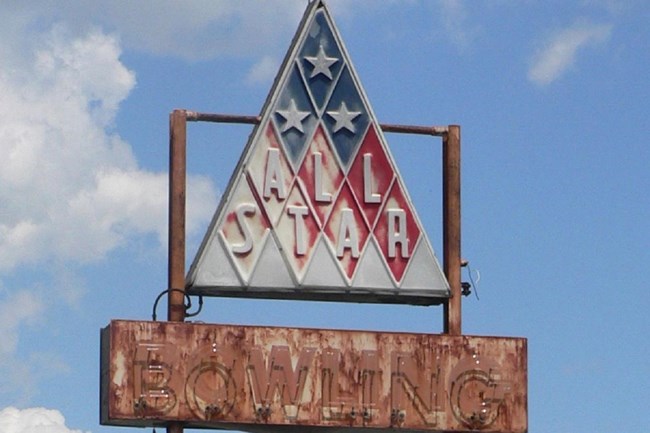 Road sign for the All Star Bowling Lane