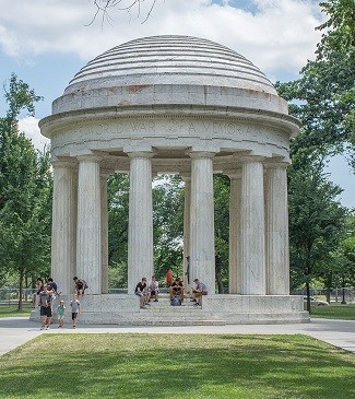 District of Columbia War Memorial honoring DC Residents who fought in WWI. Memorial is in the shape of a small marble Greek temple with domed roof, pillars around the edges, and no walls.