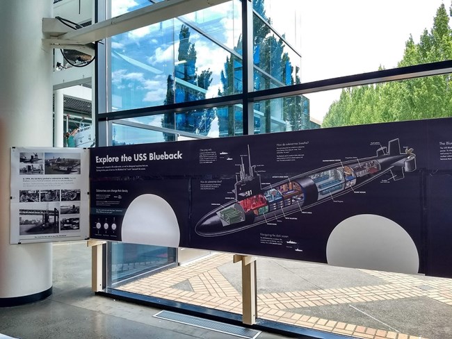 Museum exhibit showing cross section of historic submarine USS Blueback