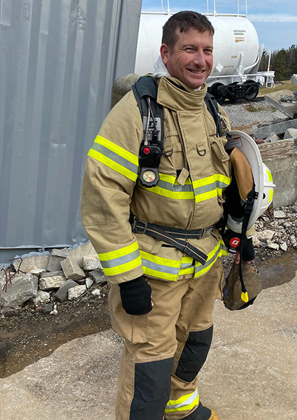 Bradley Beaty Bradley Beaty in structural fire protective equipment on the fireground.