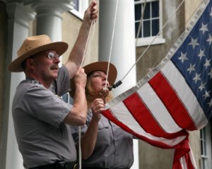 Park rangers raise flag Park rangers raise flag