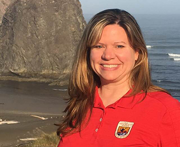 Candice Stevenson in front of ocean vista.
