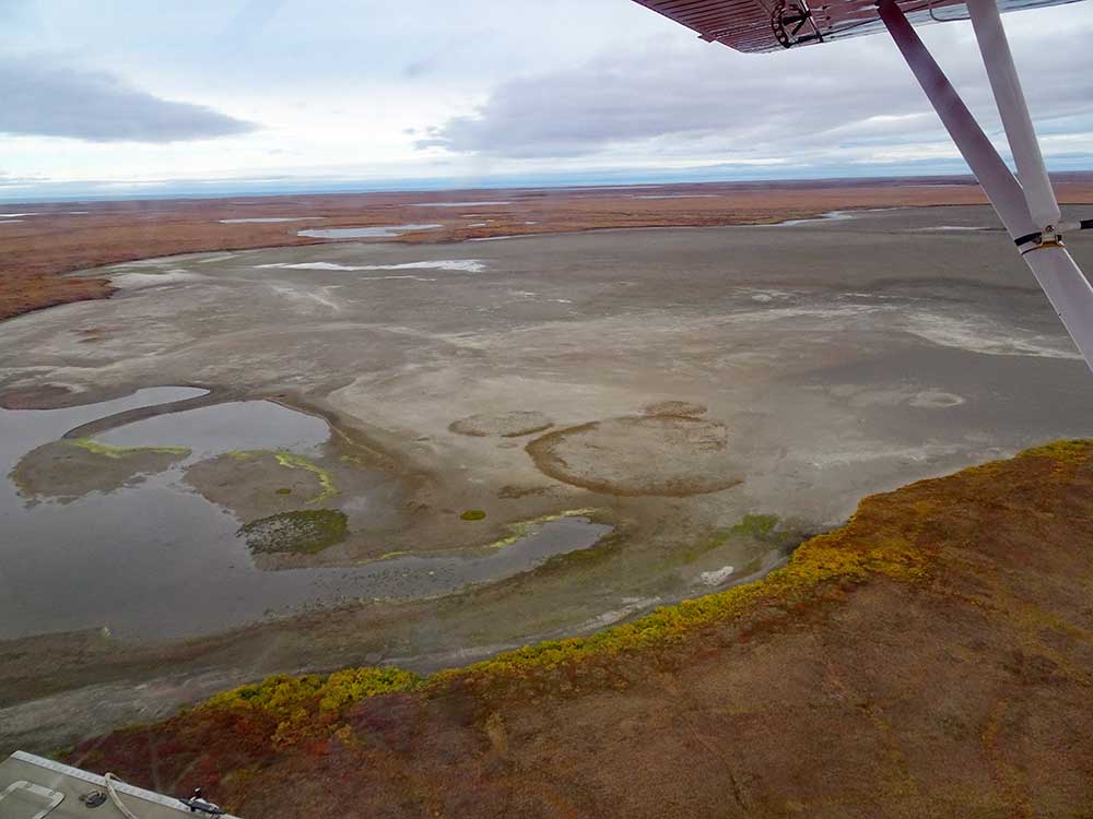 An Arctic lake bed drying.