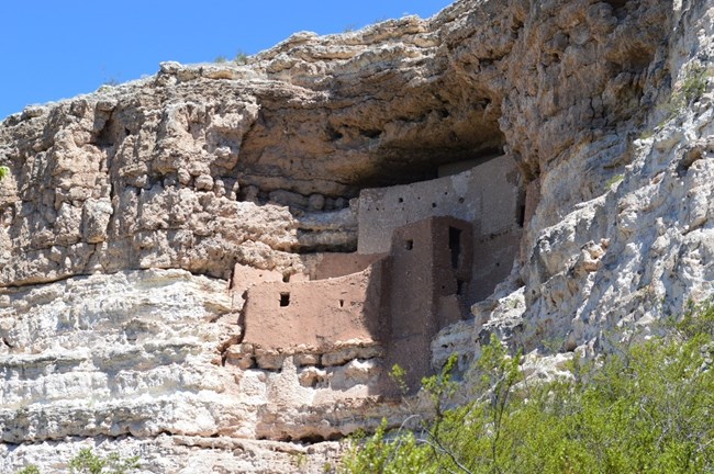 NRCA MOCA Cliff dwellings carved into sandstone.