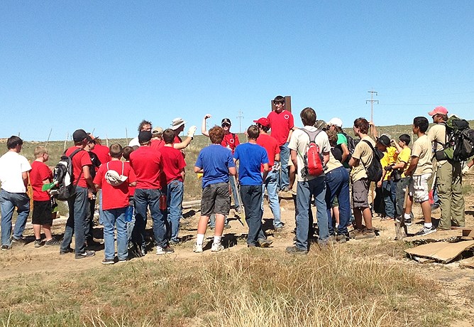 a large group of boys on the plains