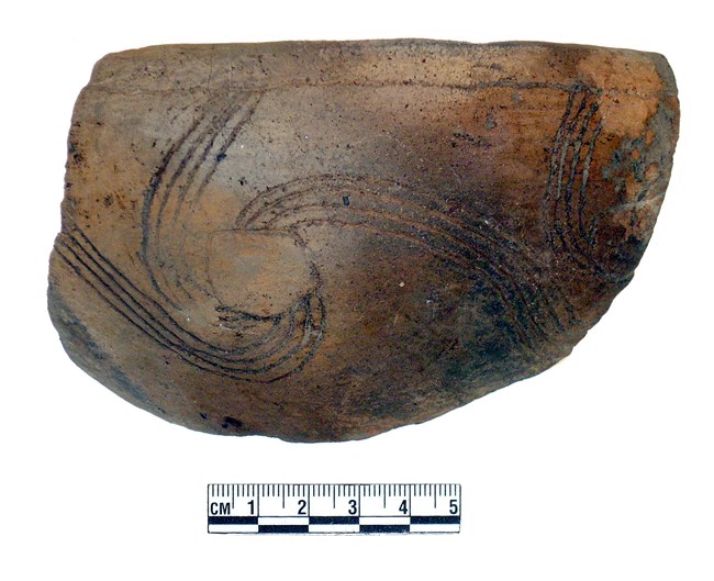 Example of Native American pottery with spiral carving