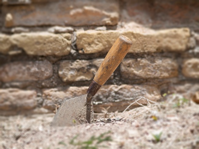 Trowel in the ground at Christiansted National Historic Site