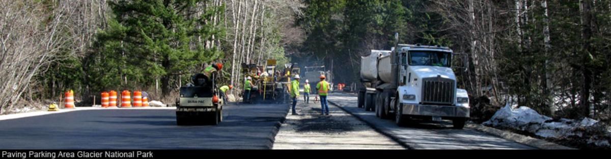 Road work glacier Crew working on a road at Glacier National Park