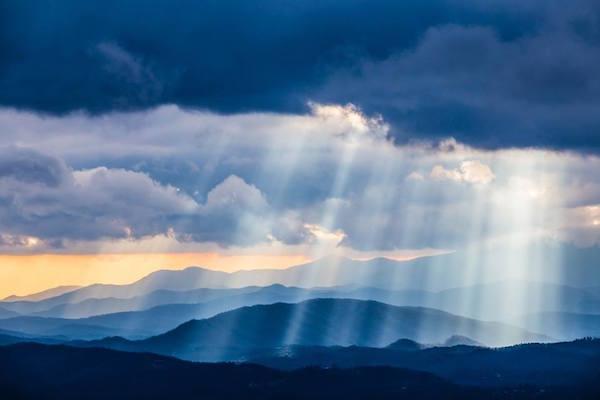 NPS photo of clouds and sunbeams above the Blue Ridge Parkway by J Ruff.