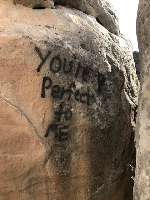 One of several rock walls in Colorado National Monument defaced by vandalism. NPS photo. One of several rock walls in Colorado National Monument defaced by vandalism. NPS photo.