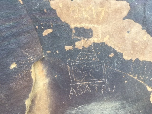 Vandalism damages a rock art panel in Mesa Verde National Park.