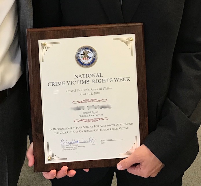 The US Attorney's Office presented an ISB Special Agent with a certificate during National Crime Victims' Rights Week. The US Attorney's Office presented an ISB Special Agent with a certificate during National Crime Victims' Rights Week.
