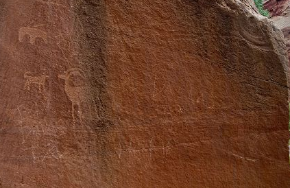Damage to a prehistoric rock art panel in Capitol Reef National Park. NPS photo.