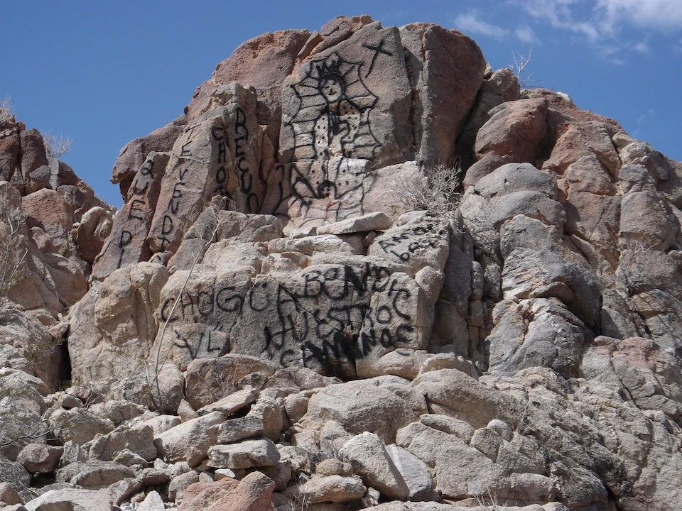 Graffiti painted on natural rock structures in Organ Pipe Cactus National Monument. NPS photo. Graffiti painted on natural rock structures in Organ Pipe Cactus National Monument. NPS photo.