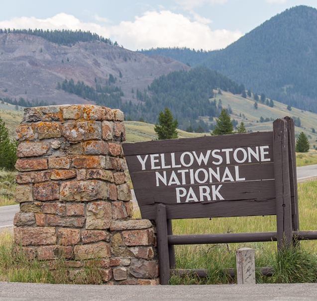 Jackson B. Coombs, age 30, was recently sentenced to prison for aggravated assault with a dangerous weapon and of simple assault in Yellowstone National Park. An entrance sign in Yellowstone National Park. NPS photo.