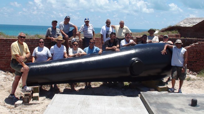 Force Reserves standing by cannon at Dry Tortugas National Park