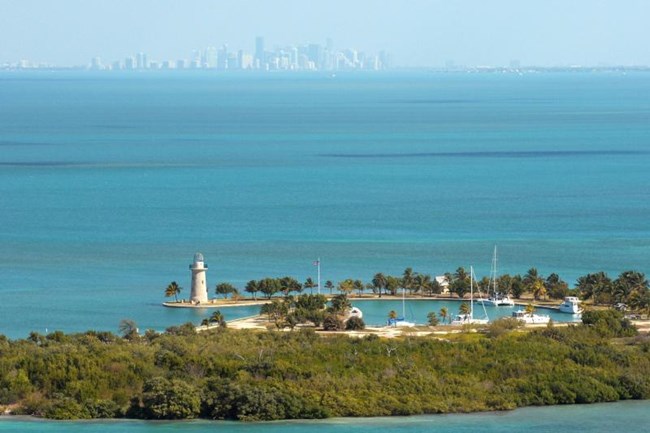 Boca Chita Key in foreground, Miami skyline in the distance, from Biscayne National Park Boca Chita Key in foreground, Miami skyline in the distance, from Biscayne National Park
