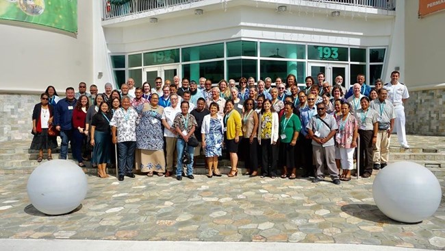 Image of a group of people standing outside