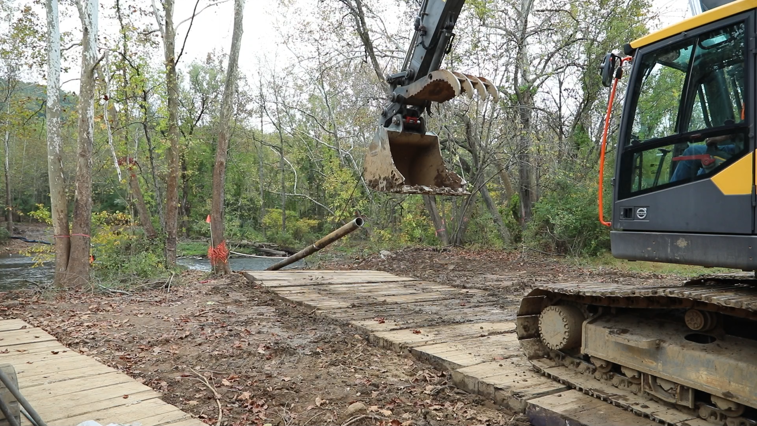 Musconetcong Pipeline(004) A large piece of equipment lifts a long metal pipe
