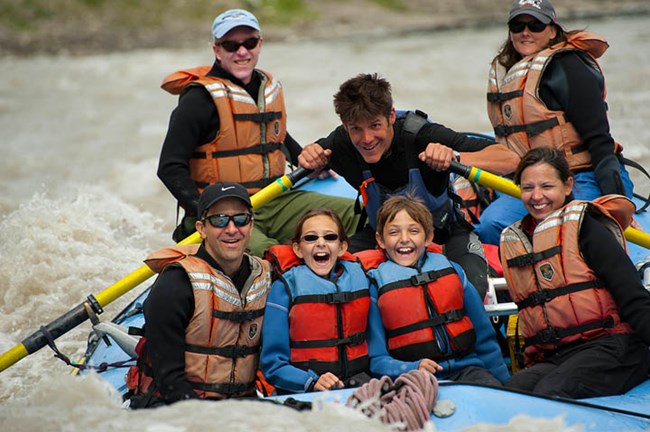 Kennicott River Rafting Trip family paddles raft on river