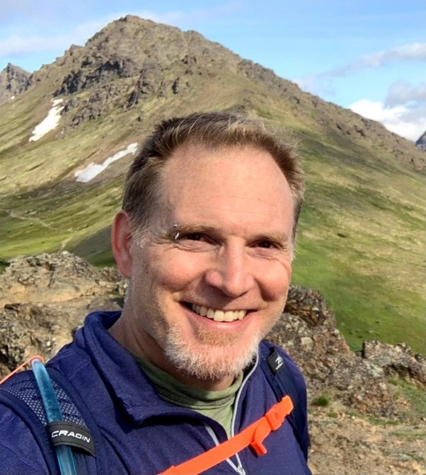 Grant Photo profile of a man with blond hair