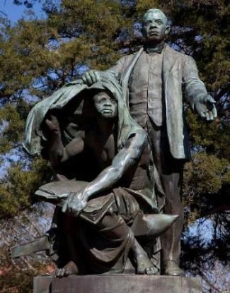 Statue of Booker T. Washington "Lifting the Veil of Ignorance" Statue of Booker T. Washington "Lifting the Veil of Ignorance" at Tuskegee University, Alabama