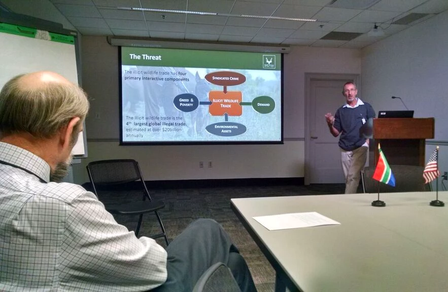 South African National Park Ranger Bruce Leslie gives a presentation on rhino anti-poaching at the Main Interior building. South African National Park Ranger Bruce Leslie gives a presentation on rhino anti-poaching at the Main Interior building.