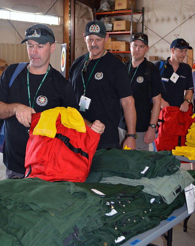 New Zealand Fire Firefighters checking out fire equipment