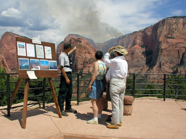 Ranger telling visitors about fire safety at Zion National Park