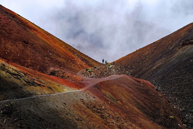 Hiker enjoys the vast wilderness views.