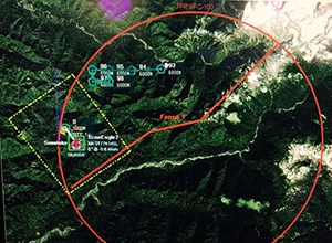 Aerial map with overlay of lines indicating area of flight restrictions and launch site.