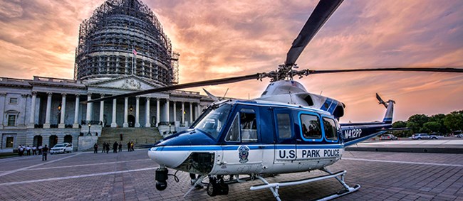 US Park Police helicopter United States Park Police helicopter on plaza in front of U.S. Capitol.